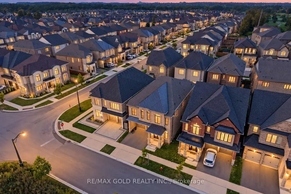 Aerial view of a street of new homes at dusk
